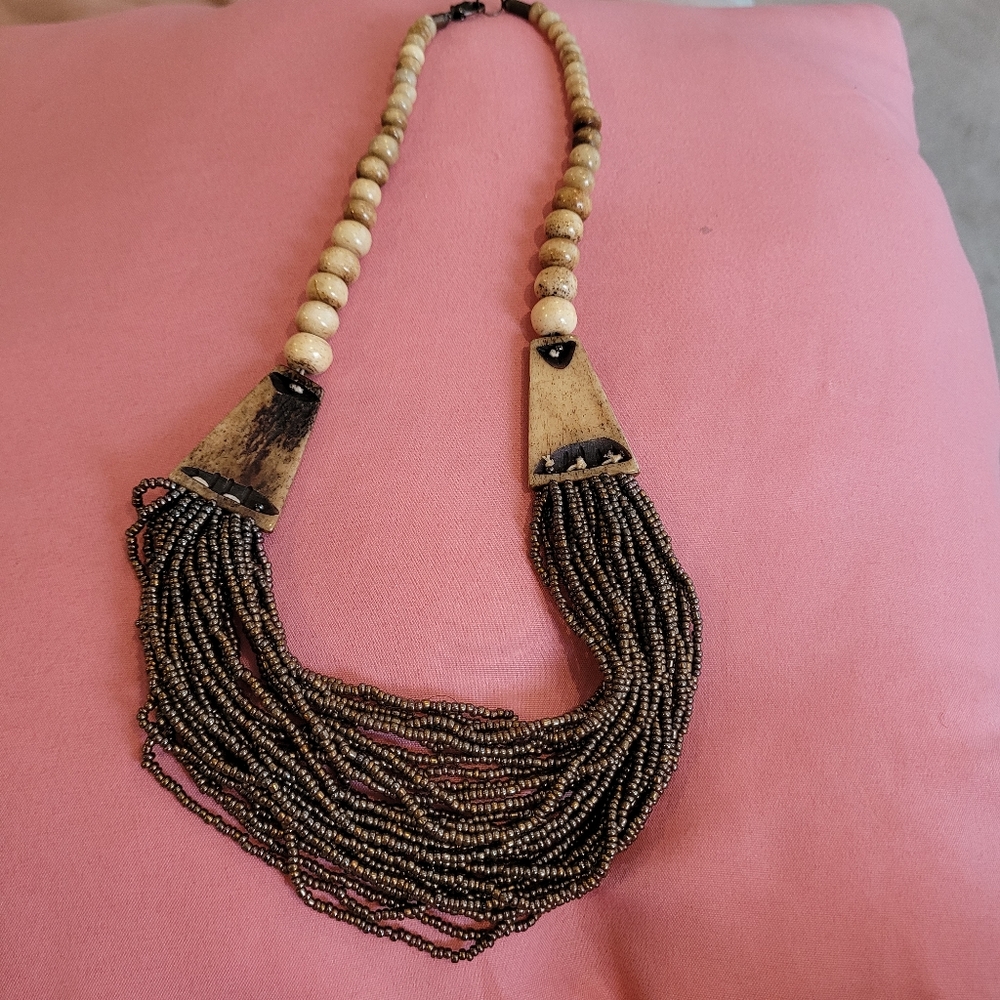 Brown seabeed necklace, wooden beads at top. - Picture 2 of 3